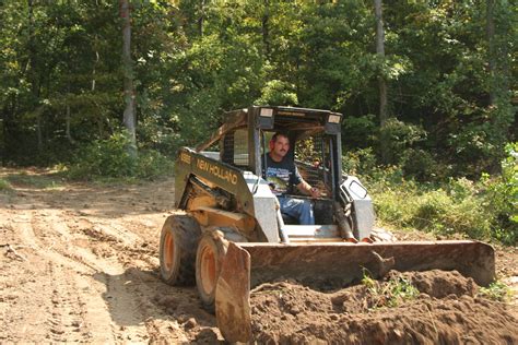 skid steer loader pond